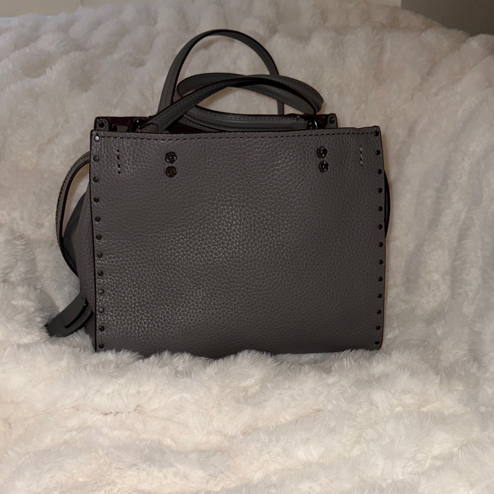 EXCELLENT CONDITION COACH ROGUE 25 with RIVETS